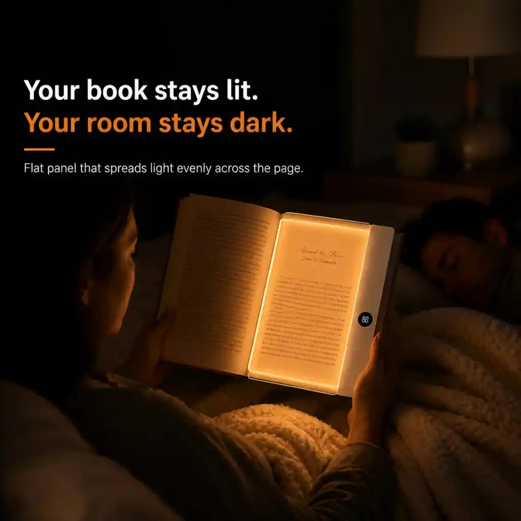 VisionGlow flat panel amber glow — your book stays lit your room stays dark — woman reading in bed at night while partner sleeps peacefully