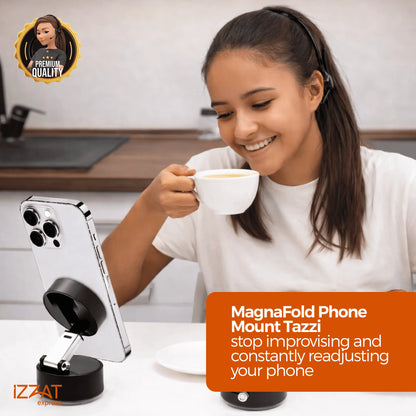 Hero lifestyle image: smiling woman in a kitchen holding a coffee cup while watching her phone propped on the Tazzi MagnaFold Phone Mount — 'Premium Quality' badge and IZZAT Express branding with tagline 'stop improvising and constantly readjusting your phone'