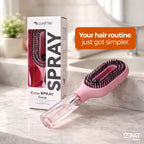 Tazzi MistPro Spray Comb and its retail box displayed on a white marble surface — elegant product lifestyle shot showing packaging design, product silhouette, and water reservoir detail